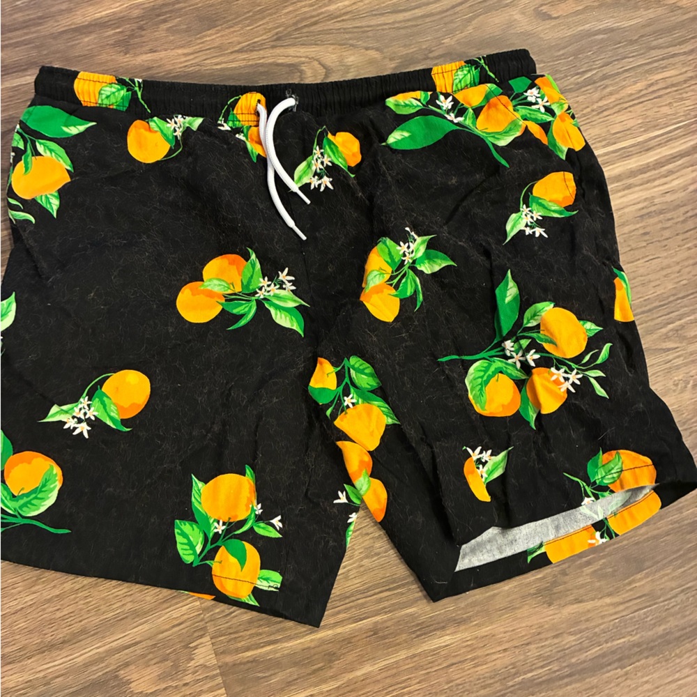 Black shorts with oranges